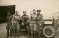 Soldiers and officers of the NKVD near garage
