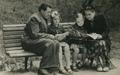 Family resting in a park
