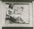Bas-relief of a women at 60 Chuprynky St. 