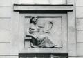 Bas-relief of a women at 60 Chuprynky St. 