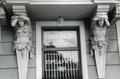 Caryatid and atlant on the façade of the building at 1 Rusovych St.