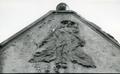 Bas-relief at 11 Kotliarevskoho St.