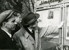 People near an information booth