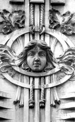 Mask on The Building. 14-16 Kostia Levytskoho Street