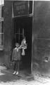 Schoolboy in the door of school