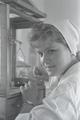 Zhdanov grain elevator. N. Byliaieva and laboratory assistant L. Romaniuk take samples