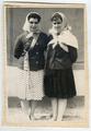Two young women wearing a headscarves