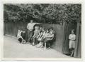 Children in front of the house