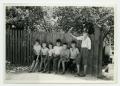 Children in front of the house