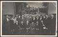 Employees of "Artemgeologiya" in front of the painting "Lenin i dity" ["Lenin and Children," eng.]