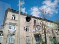 Пошкоджений вибухом будинок