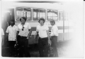 Men near the bus