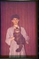 Portrait of a man with a cat