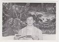 Portrait of a man with postcards