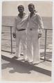 Two sailors on the pier